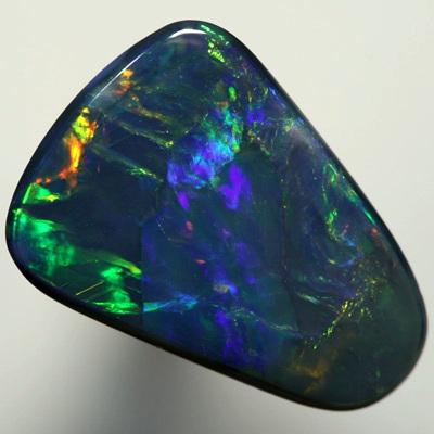 SOLID BLACK OPAL  Bright and very strong gem fire SEE VIDEO